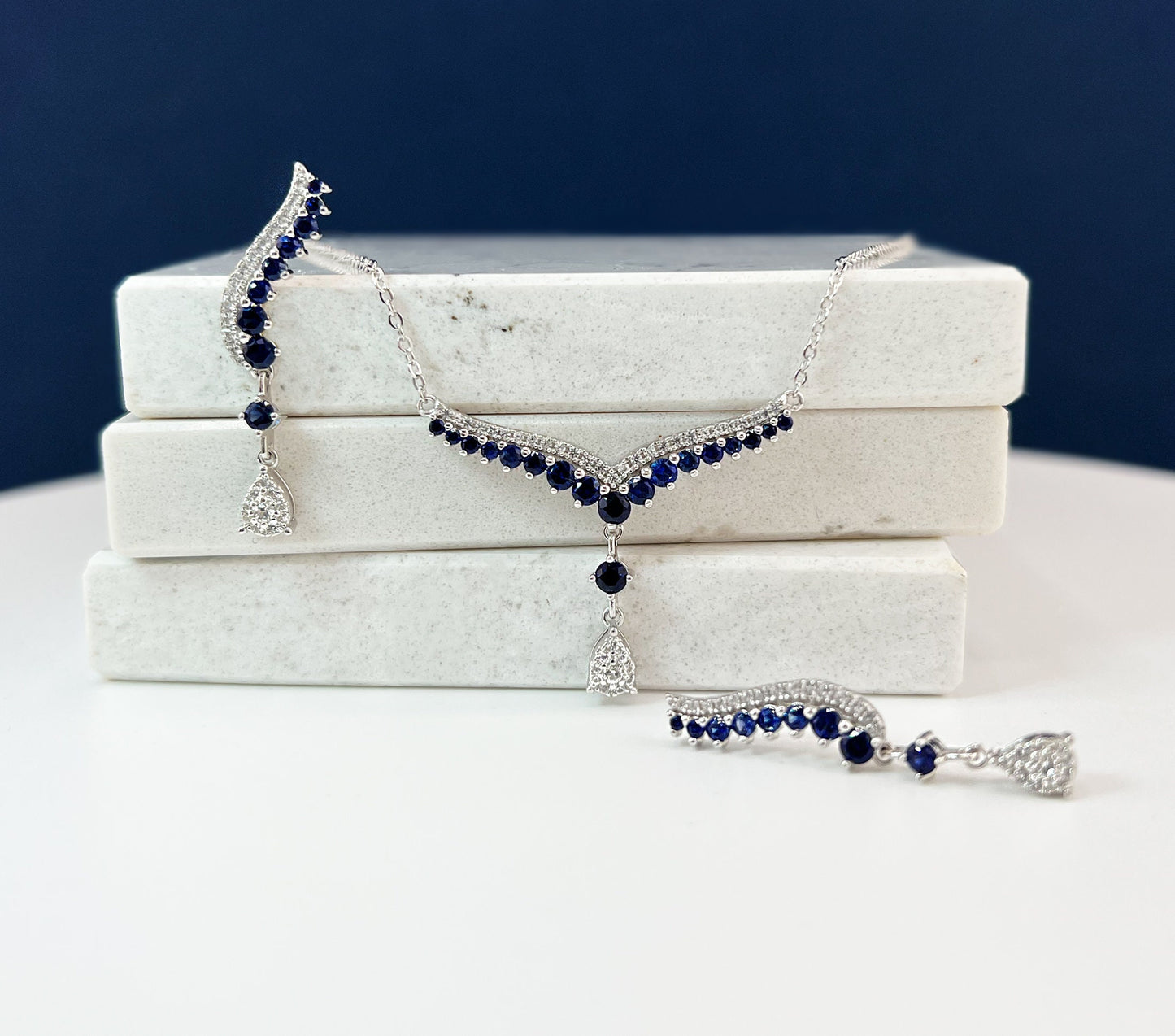 Teardrop Sapphire Necklace: Rhodium Plated Sterling Silver V Collar