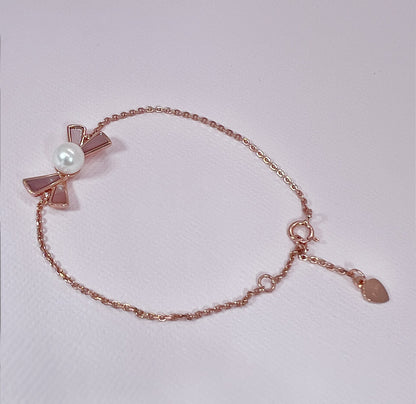 Rose Gold Bow Pearl Bracelet: Sterling Silver, Mother-of-Pearl Charm