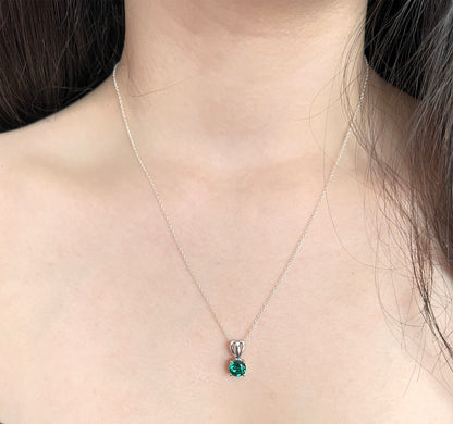Emerald Solitaire Pendant Necklace: Rhodium Plated Sterling Silver