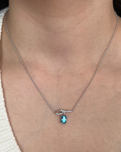 Sterling Silver Bow Pendant Necklace: Blue Cubic Zirconia, Adjustable Chain
