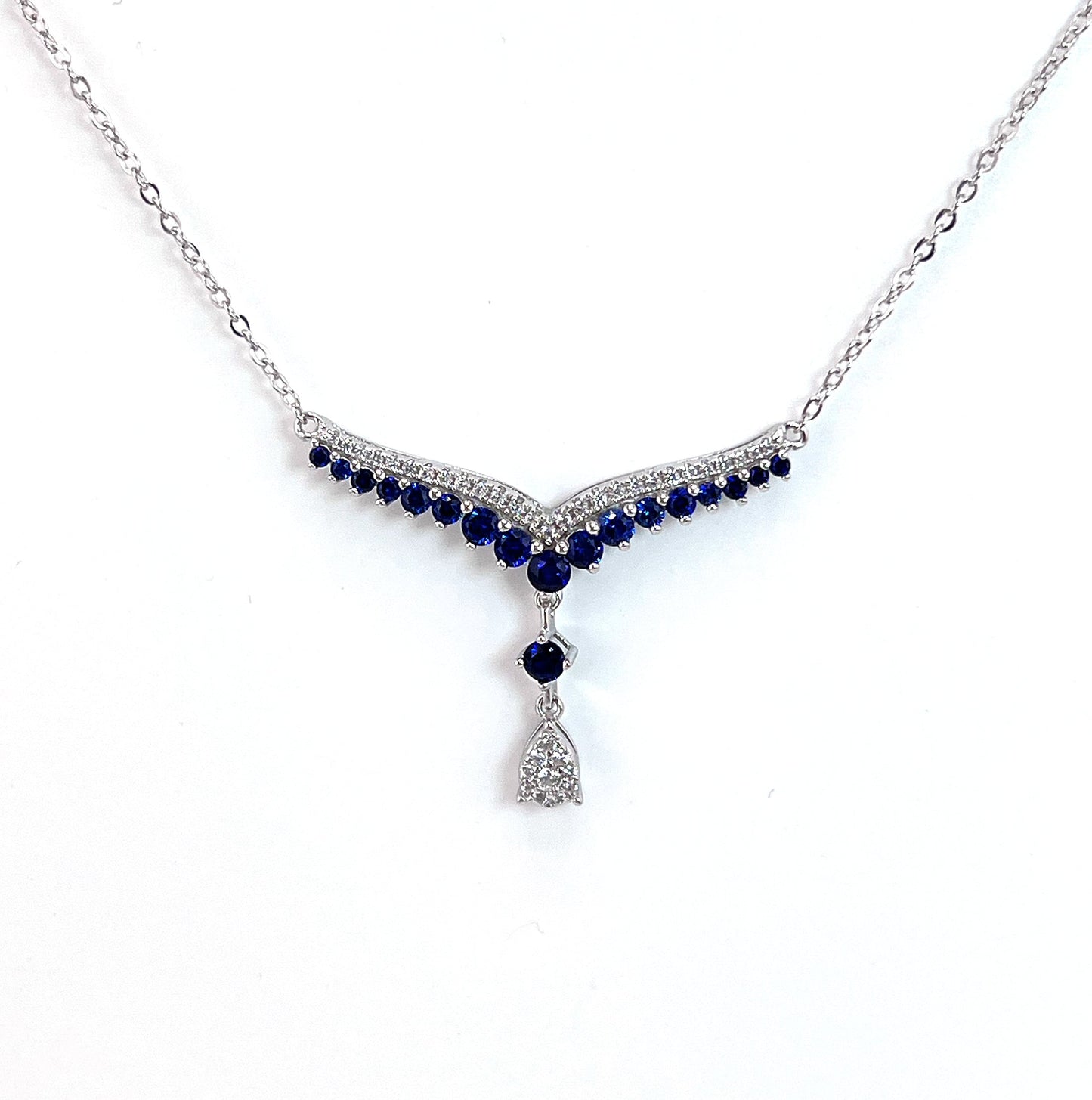 Teardrop Sapphire Necklace: Rhodium Plated Sterling Silver V Collar