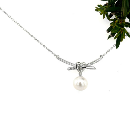 Love Knot Pearl Necklace: Rhodium Sterling Silver Heart Pendant