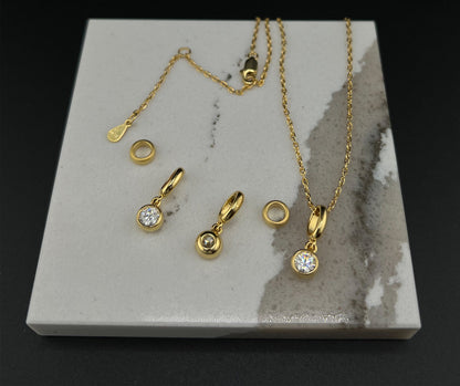 1.5 CT Moissanite Bezel Pendant Necklace: 14K Yellow Gold Plated Sterling Silver