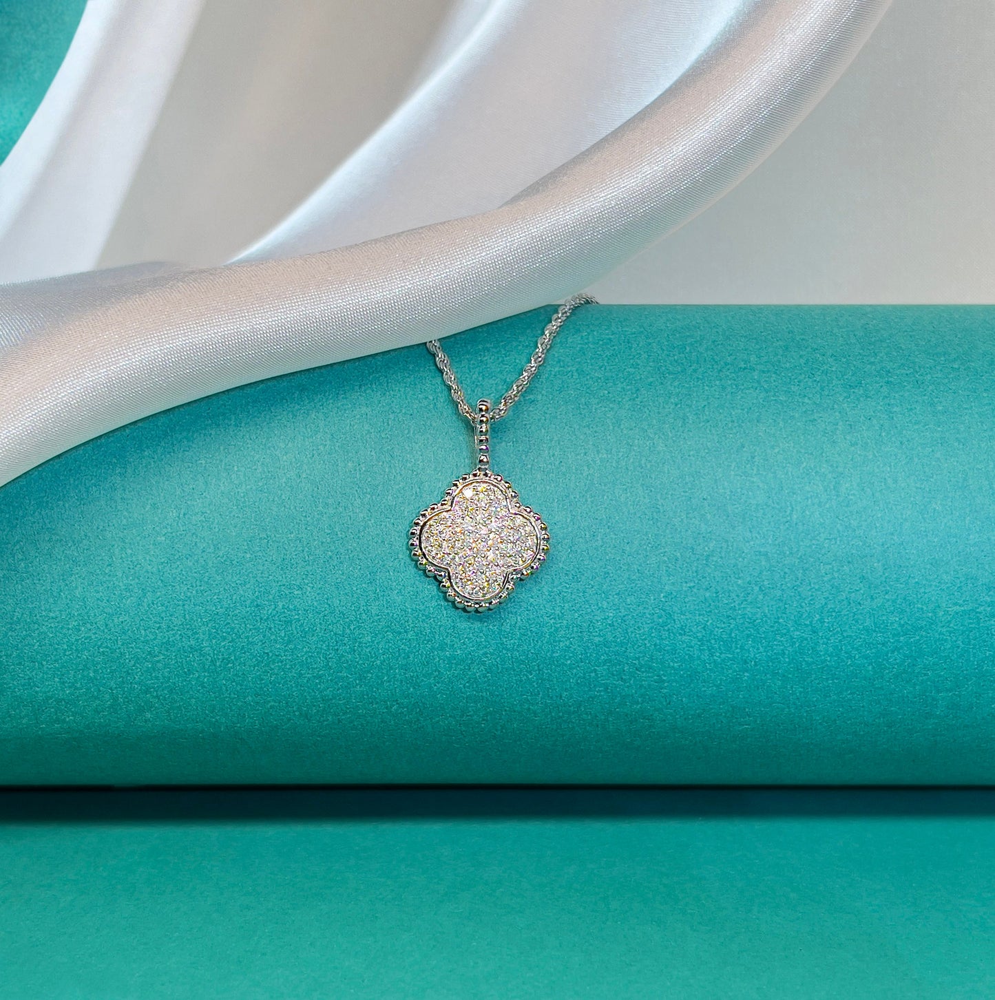 Moissanite Four-Leaf Clover Necklace: Rhodium Plated Sterling Silver Pendant