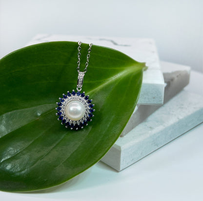 Freshwater Pearl & Blue Sapphire Halo Pendant: Rhodium-Plated Silver Necklace