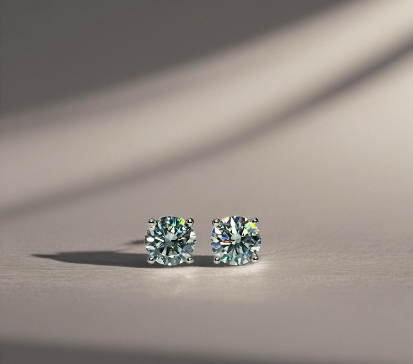 Certified Moissanite Stud Earrings – Unisex Round Solitaire Earrings in Rhodium Plated Sterling Silver, Diamond Alternative 4-Prong Studs