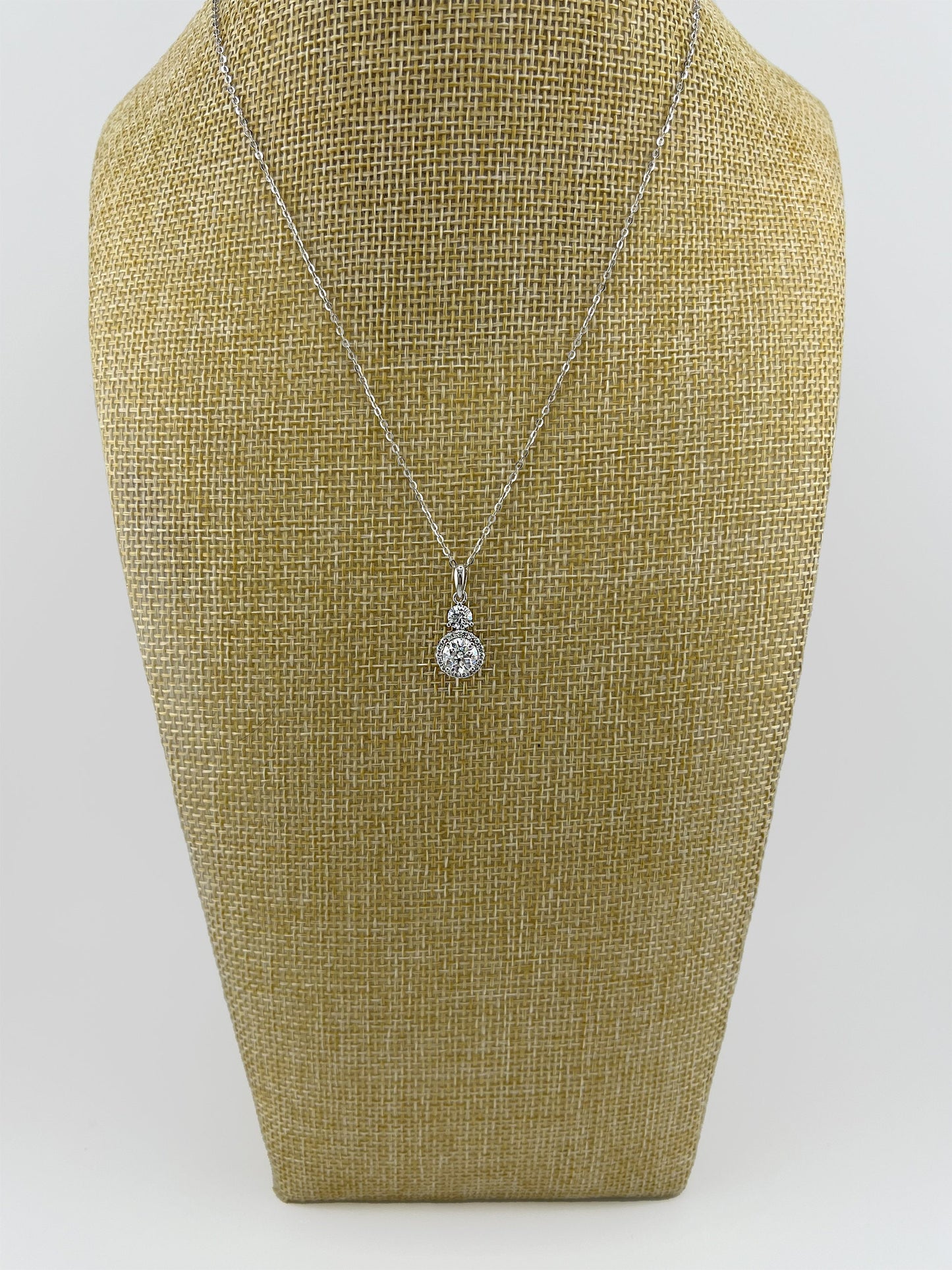 1.5CTW VVS1 Moissanite Halo Necklace: Rhodium Plated Sterling Silver Pendant