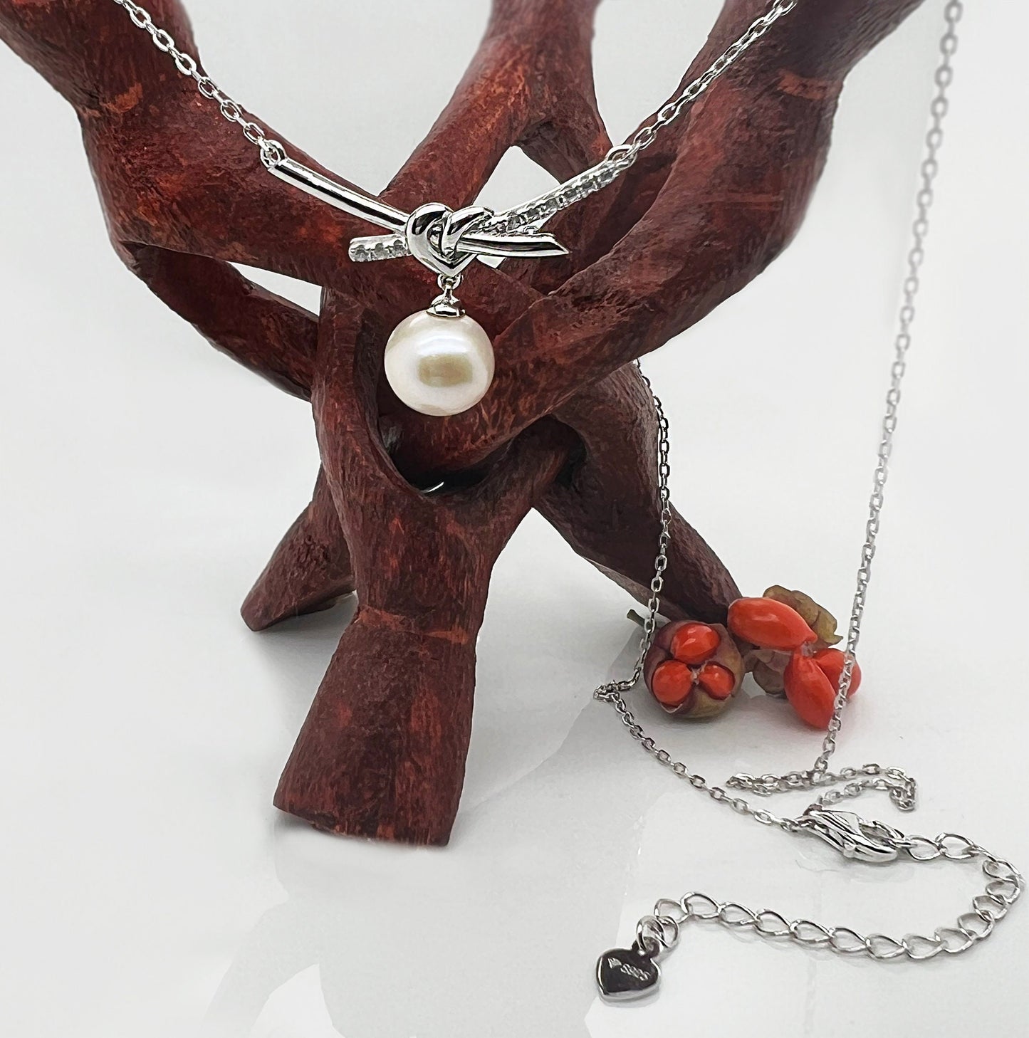 Love Knot Pearl Necklace: Rhodium Sterling Silver Heart Pendant