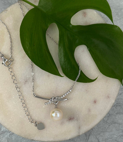 Love Knot Pearl Necklace: Rhodium Sterling Silver Heart Pendant