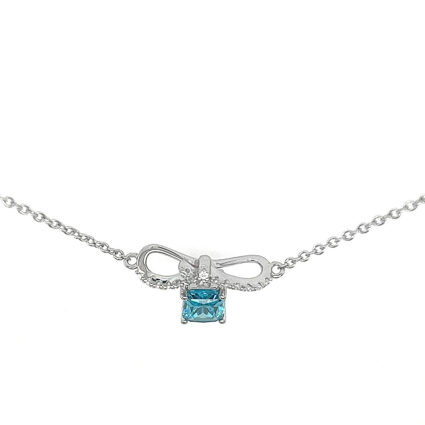 Sterling Silver Bow Pendant Necklace: Blue Cubic Zirconia, Adjustable Chain