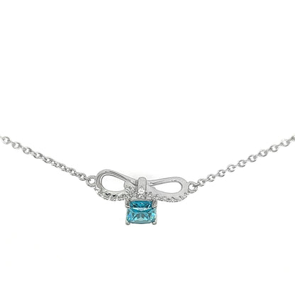Sterling Silver Bow Pendant Necklace: Blue Cubic Zirconia, Adjustable Chain