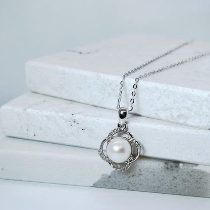 Moissanite Freshwater Pearl Necklace: Sterling Silver Floral Pendant
