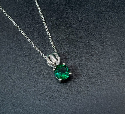 Emerald Solitaire Pendant Necklace: Rhodium Plated Sterling Silver