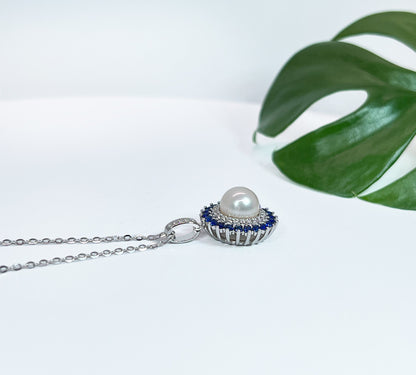 Freshwater Pearl & Blue Sapphire Halo Pendant: Rhodium-Plated Silver Necklace