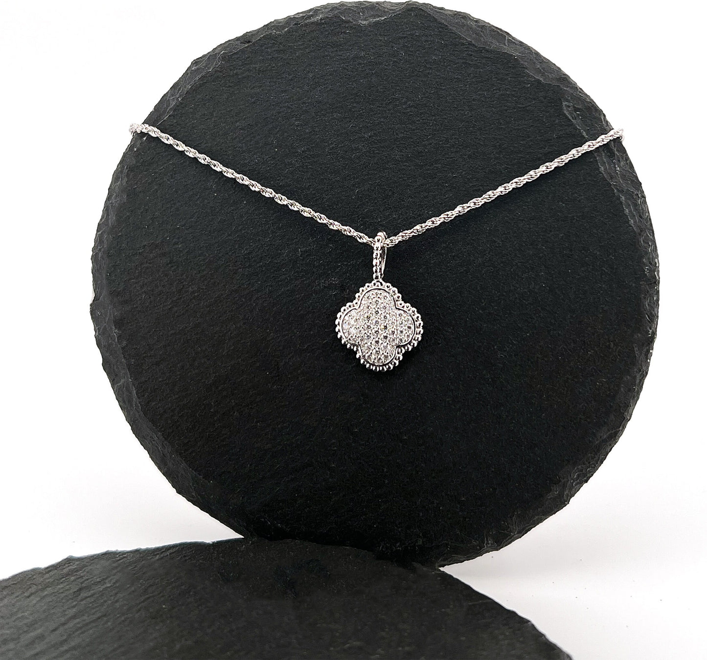 Moissanite Four-Leaf Clover Necklace: Rhodium Plated Sterling Silver Pendant