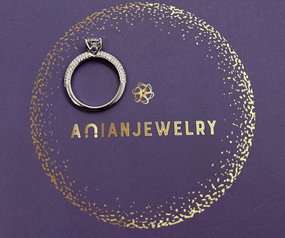 1 Ct VVS1 Moissanite Engagement Ring: Rhodium Plated Sterling Silver Pavé Band