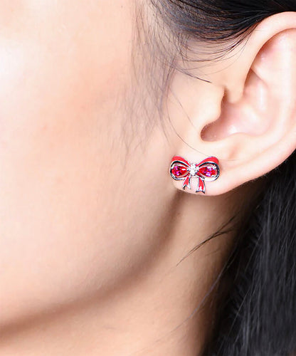 Sterling Silver Ruby Bow Earrings: Pear Cut Gemstone Studs