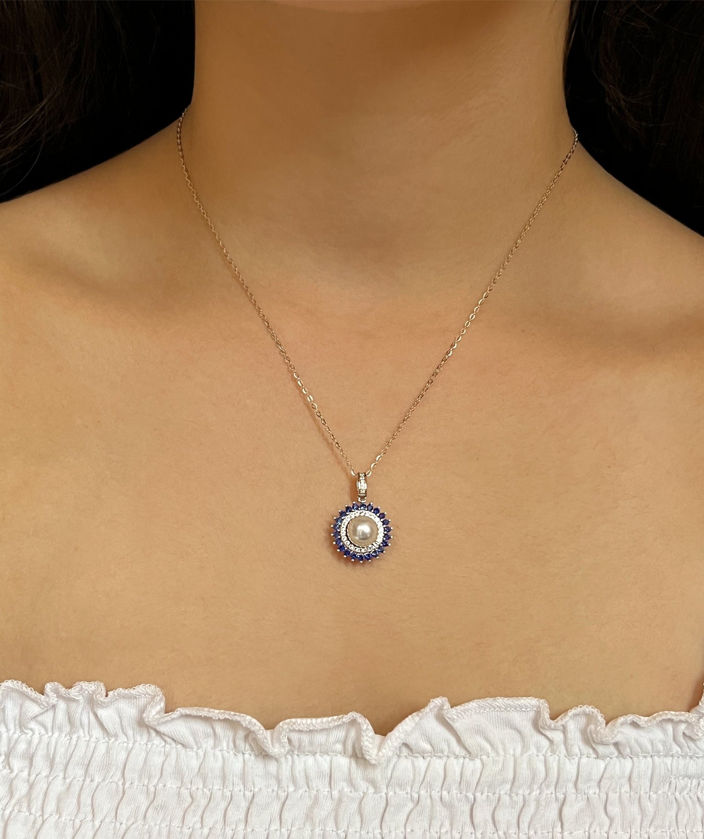 Freshwater Pearl & Blue Sapphire Halo Pendant: Rhodium-Plated Silver Necklace