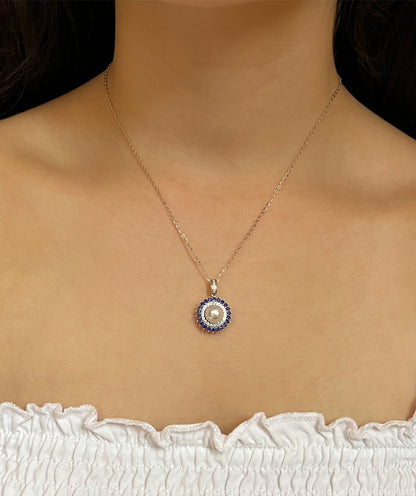 Freshwater Pearl & Blue Sapphire Halo Pendant: Rhodium-Plated Silver Necklace