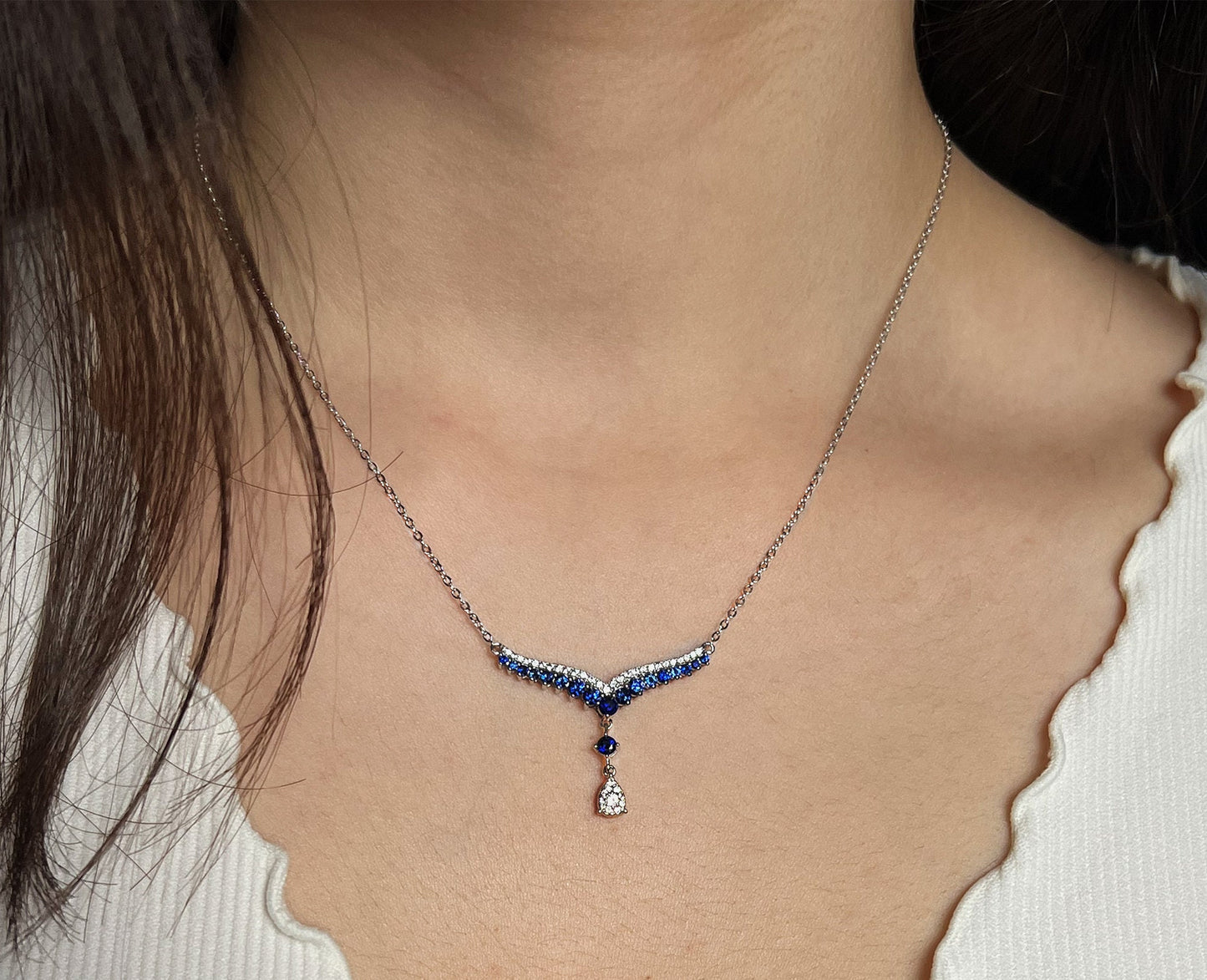 Teardrop Sapphire Necklace: Rhodium Plated Sterling Silver V Collar
