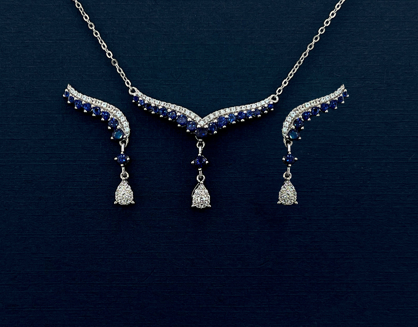 Teardrop Sapphire Necklace: Rhodium Plated Sterling Silver V Collar