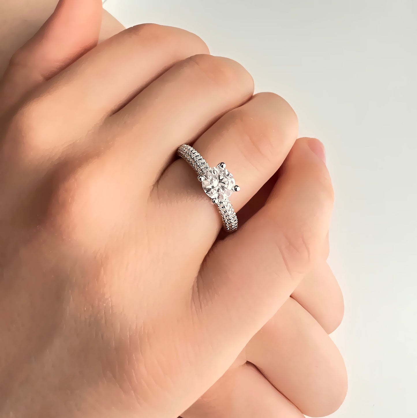 1 Ct VVS1 Moissanite Engagement Ring: Rhodium Plated Sterling Silver Pavé Band