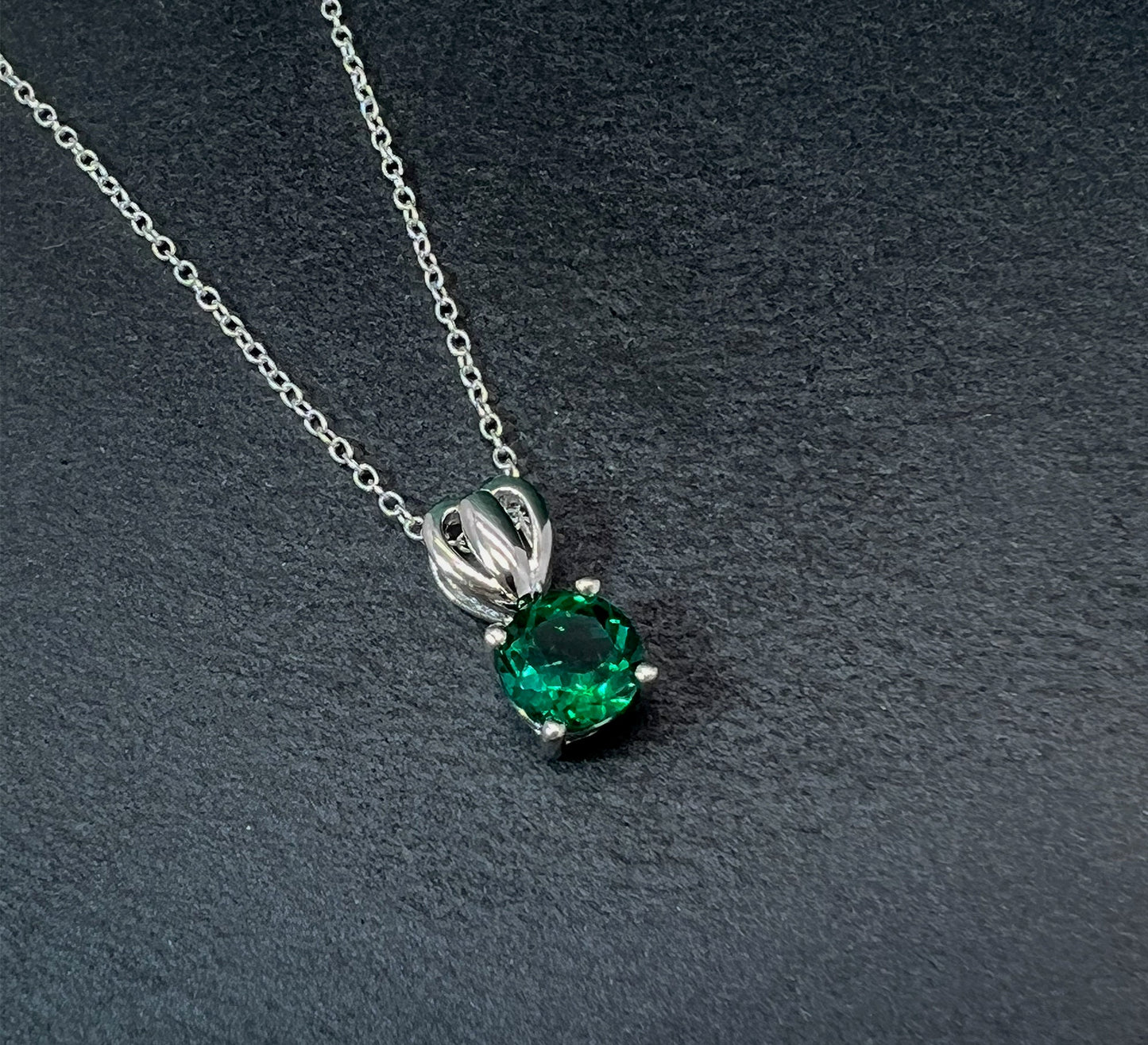 Emerald Solitaire Pendant Necklace: Rhodium Plated Sterling Silver