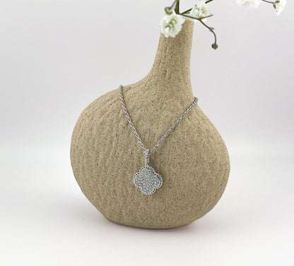 Moissanite Four-Leaf Clover Necklace: Rhodium Plated Sterling Silver Pendant