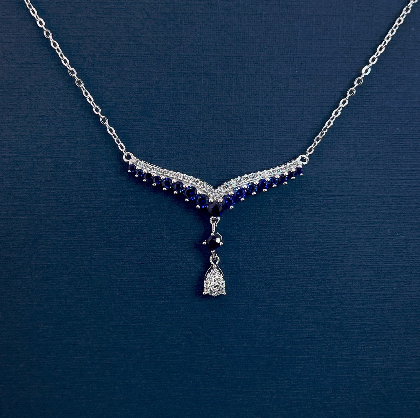 Teardrop Sapphire Necklace: Rhodium Plated Sterling Silver V Collar