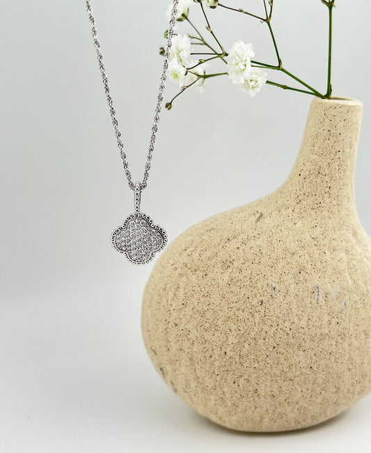 Moissanite Four-Leaf Clover Necklace: Rhodium Plated Sterling Silver Pendant