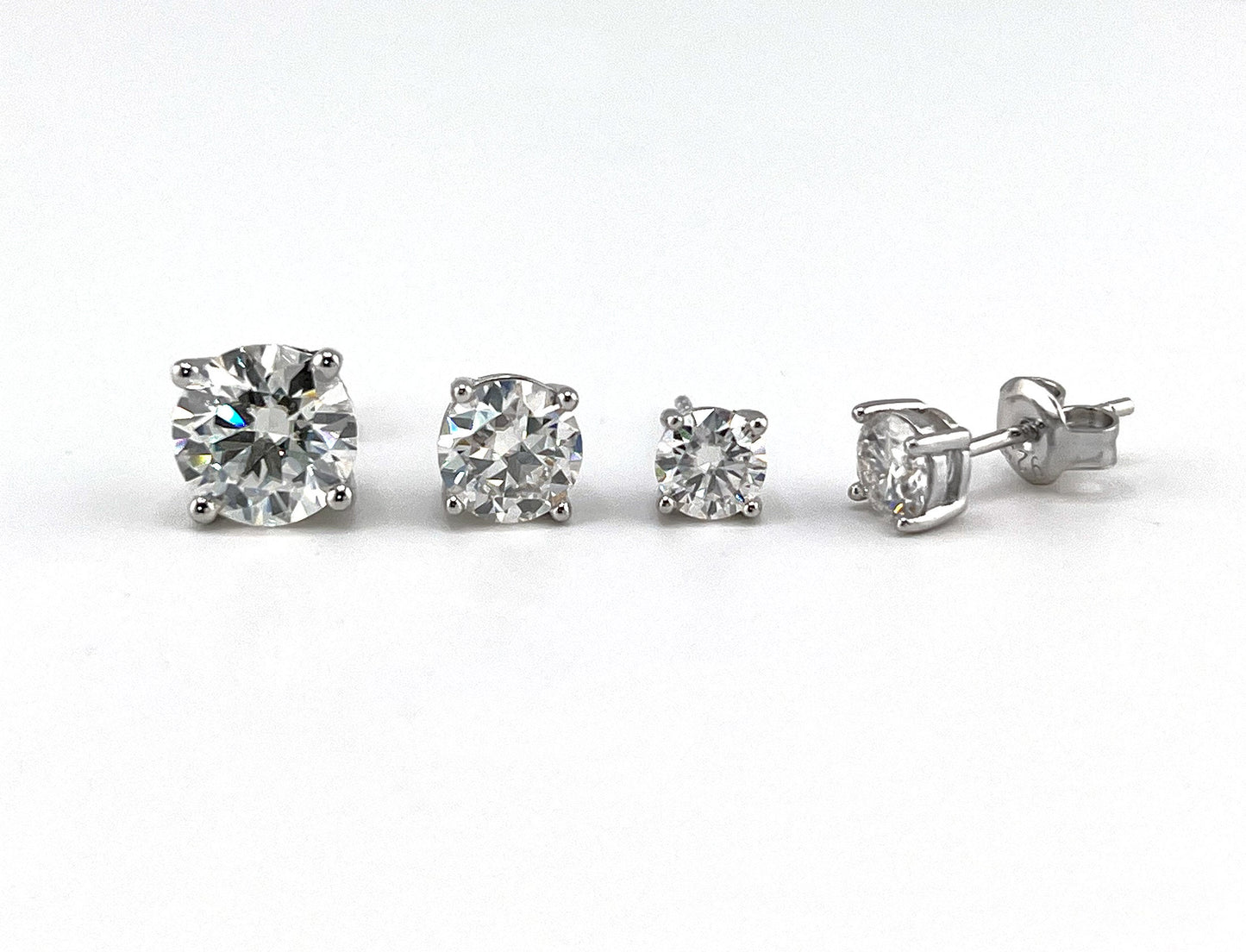 Certified Moissanite Stud Earrings – Unisex Round Solitaire Earrings in Rhodium Plated Sterling Silver, Diamond Alternative 4-Prong Studs