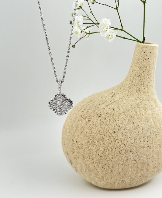 Moissanite Four-Leaf Clover Necklace: Rhodium Plated Sterling Silver Pendant