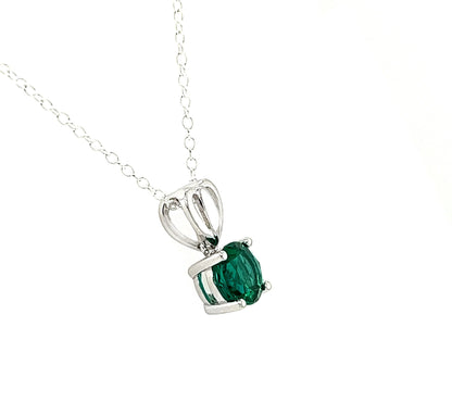 Emerald Solitaire Pendant Necklace: Rhodium Plated Sterling Silver
