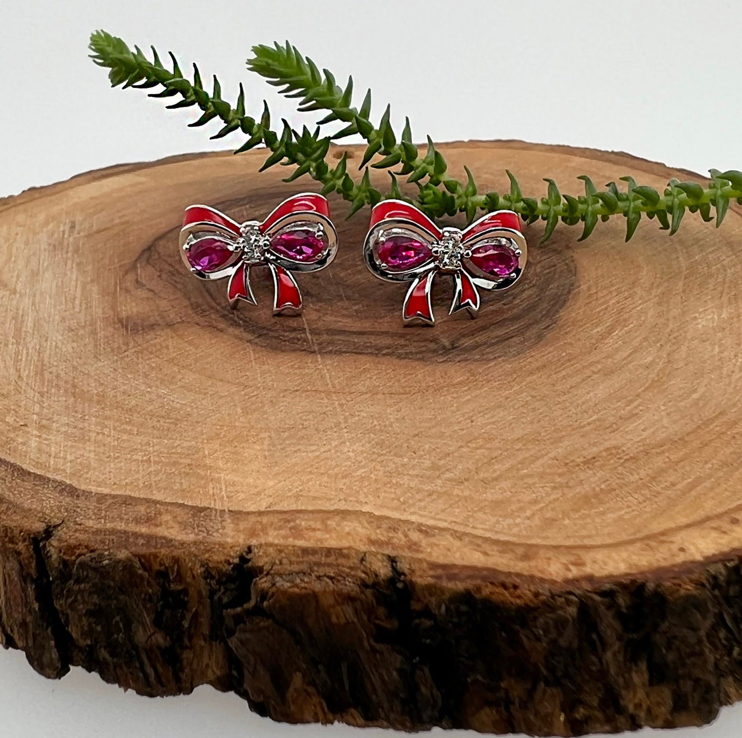 Sterling Silver Ruby Bow Earrings: Pear Cut Gemstone Studs