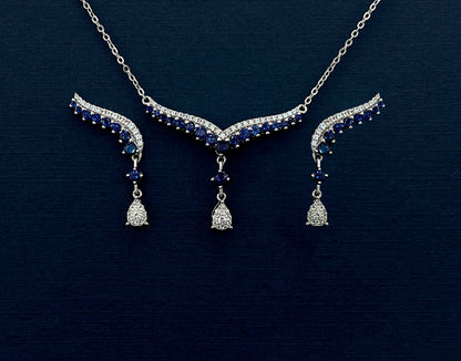 Teardrop Sapphire Necklace: Rhodium Plated Sterling Silver V Collar