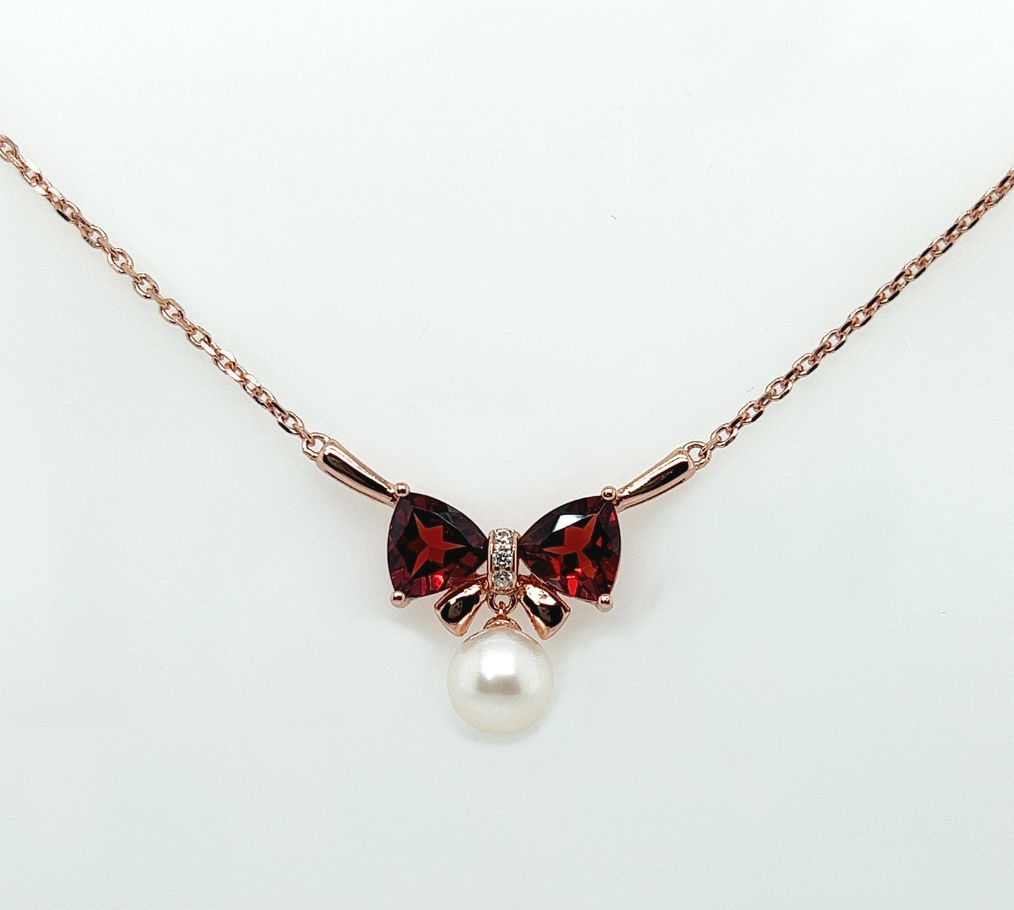 Rose Gold Bow Necklace: Garnet & Freshwater Pearl Pendant, Sterling Silver