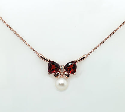 Rose Gold Bow Necklace: Garnet & Freshwater Pearl Pendant, Sterling Silver
