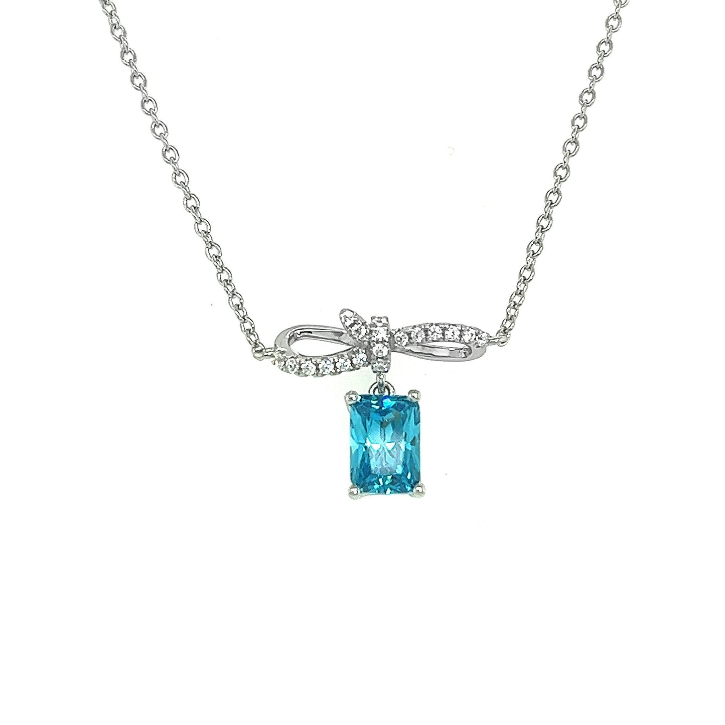 Sterling Silver Bow Pendant Necklace: Blue Cubic Zirconia, Adjustable Chain