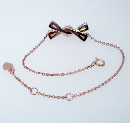 Rose Gold Bow Pearl Bracelet: Sterling Silver, Mother-of-Pearl Charm